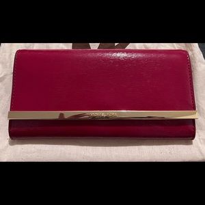 Micheal Kors Red Patent Leather clutch/crossbody bag